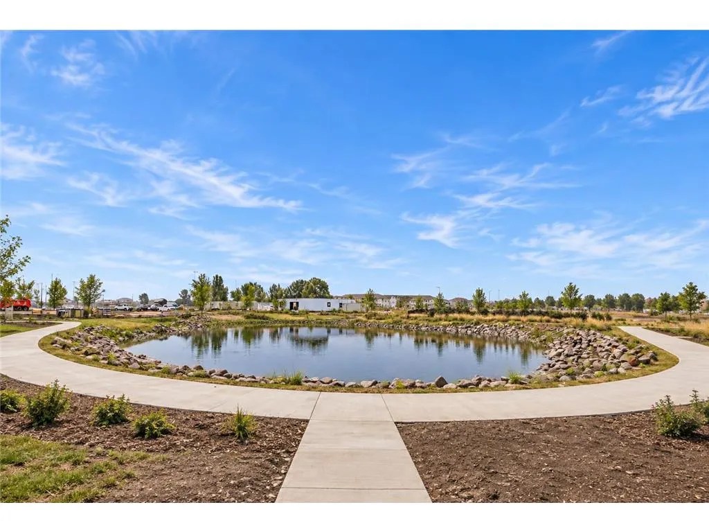 The pond and walking path beside the building